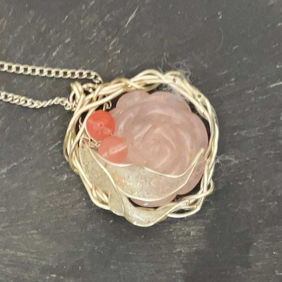 Sale priced carved rose in rode quartz gemstone pendant