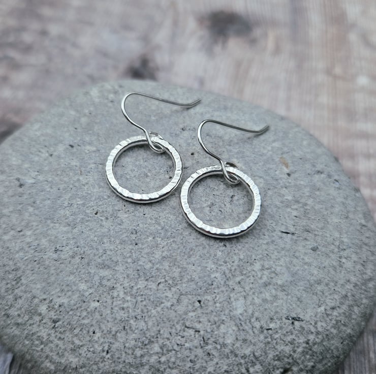 Textured silver hoop deals earrings