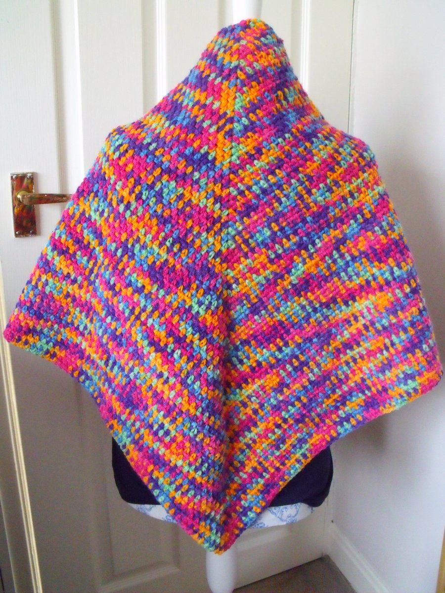 multicoloured bright crocheted shawl