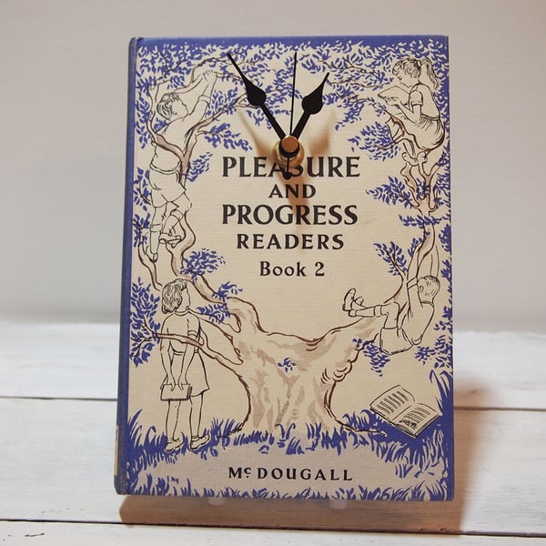 SALE Clock upcycled from the book Pleasure & Progress Readers (1958)