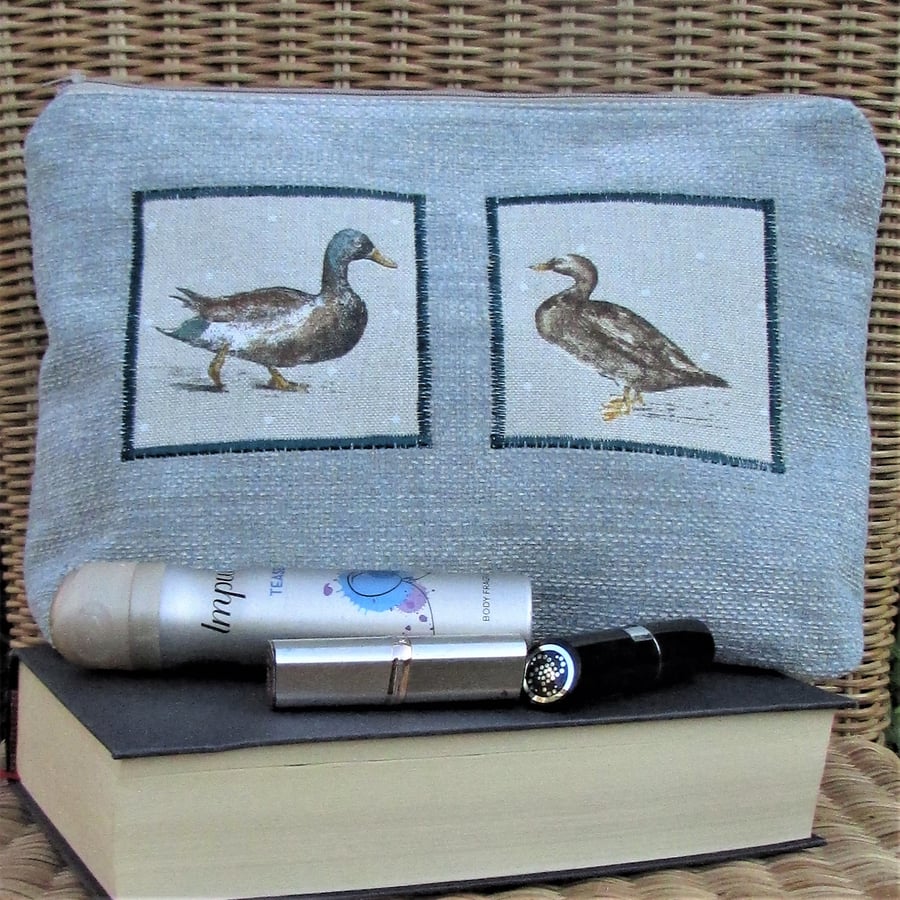 Pale blue toiletry bag, wash bag with two panels featuring Mallard ducks