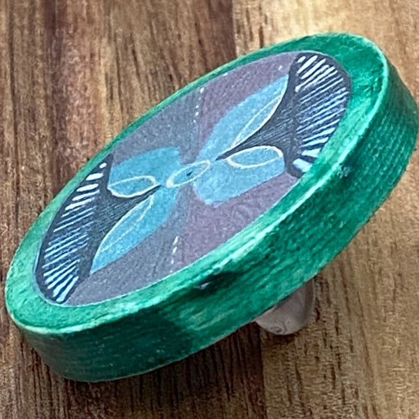 Handmade wooden brooch with floral motif