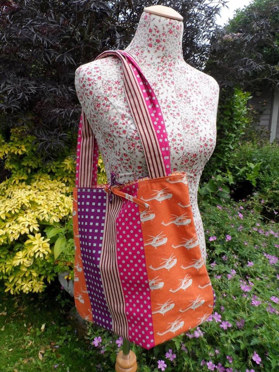 Shoulder bag in a vibrant striped helicopter linen print fabric. FREE UK Postage