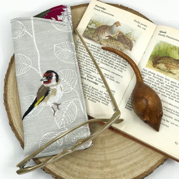 Glasses case with embroidered goldfinch