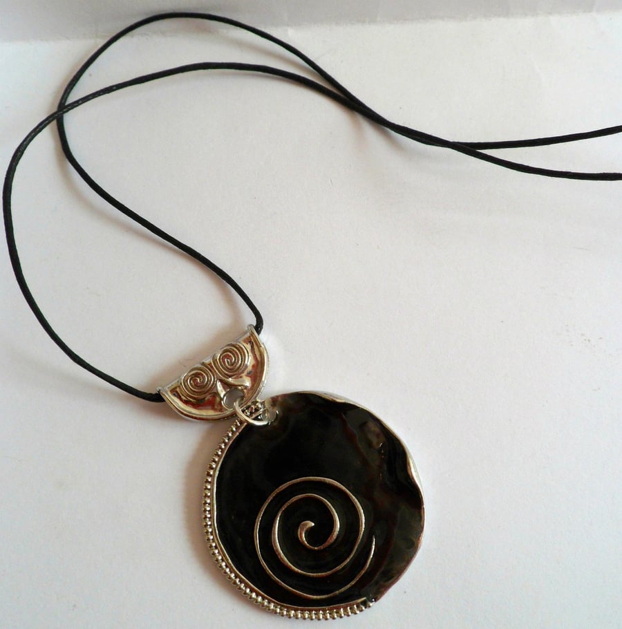 Silver plated black enamelled pedant on black cord