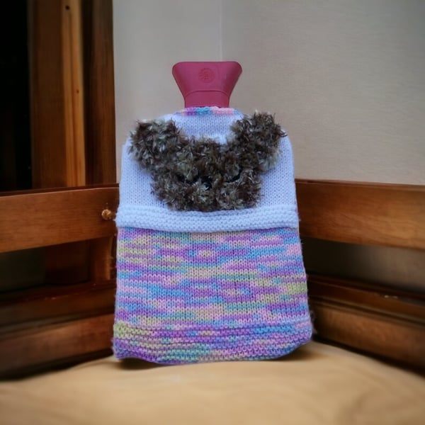 hot water bottle cover with a fluffy teddy in bed design Seconds Sunday