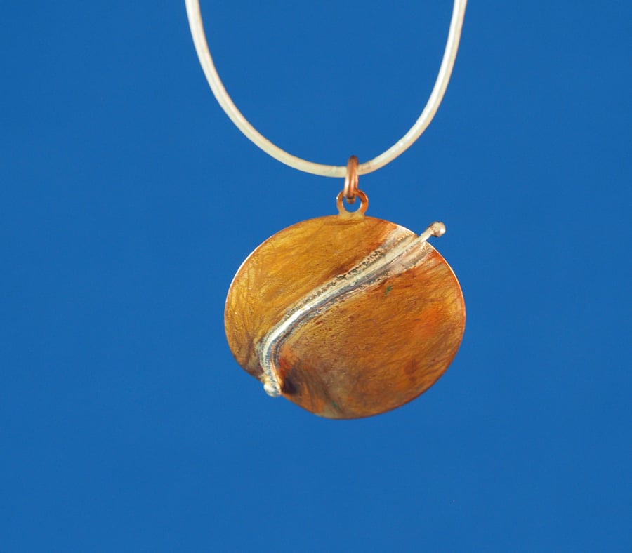 Comet Copper and Silver Circular Pendant