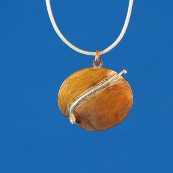 Comet Copper and Silver Circular Pendant
