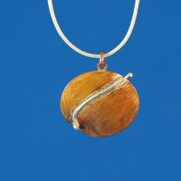 Comet Copper and Silver Circular Pendant