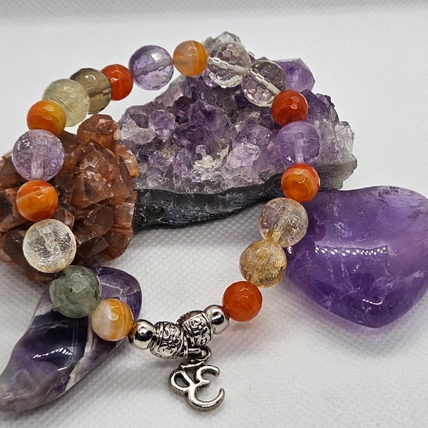 Multi-gemstone muti-coloured stretch bracelet with silver ohm charm