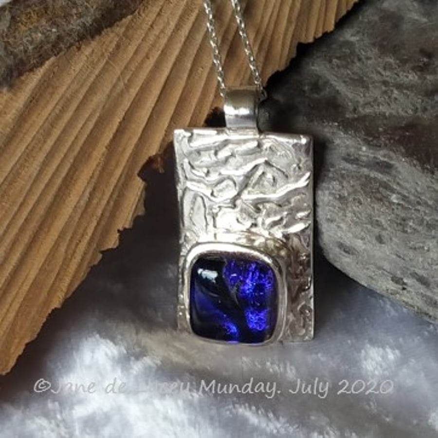 Fine Silver Pendant with Purple Glass Cabachon
