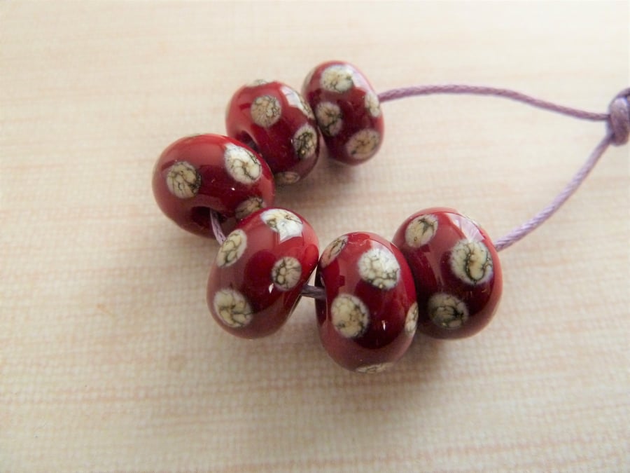 red and ivory spot lampwork glass beads