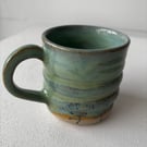 Handmade ceramic stoneware bubble green mug
