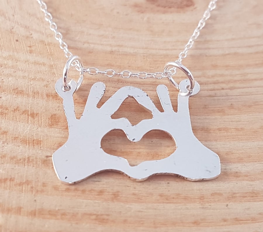 Sterling Silver Heart Fingers Necklace
