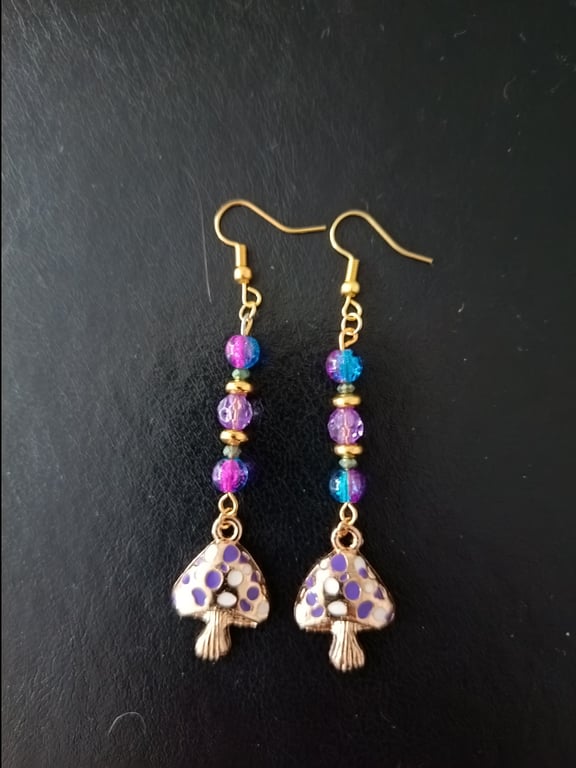 Purple and blue beaded cottage core dangle earrings with toadstool charms 