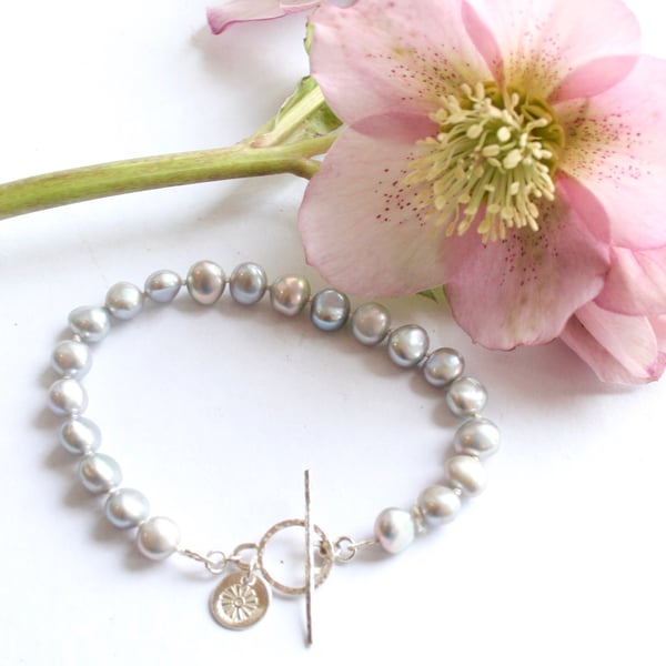 Pearl and silver toggle bracelet