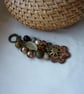 BROWN AND BRONZE FLOWER HANDBAG CHARM.  899 - Image 2
