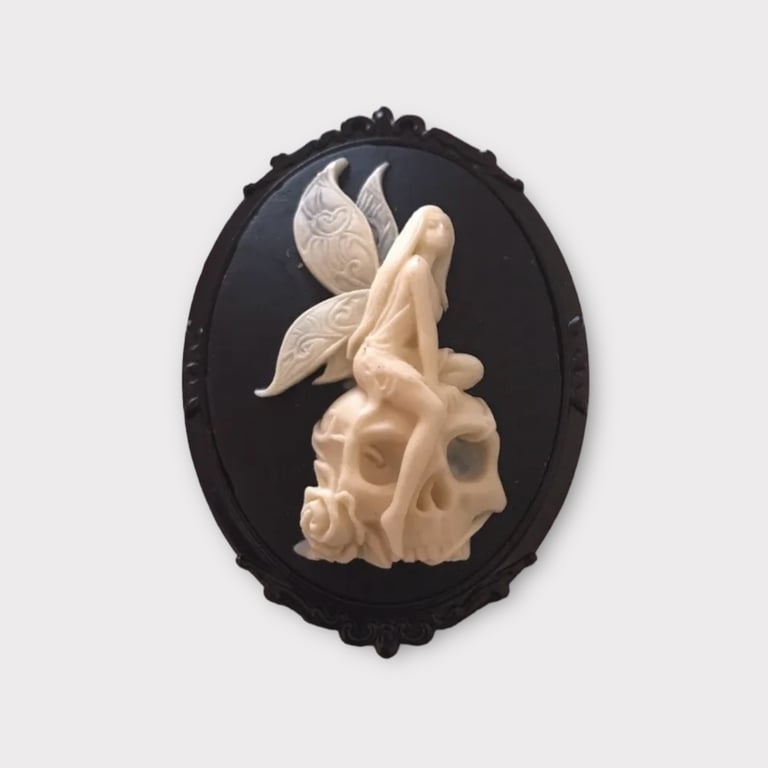 Fairy sat on Skull Brooch