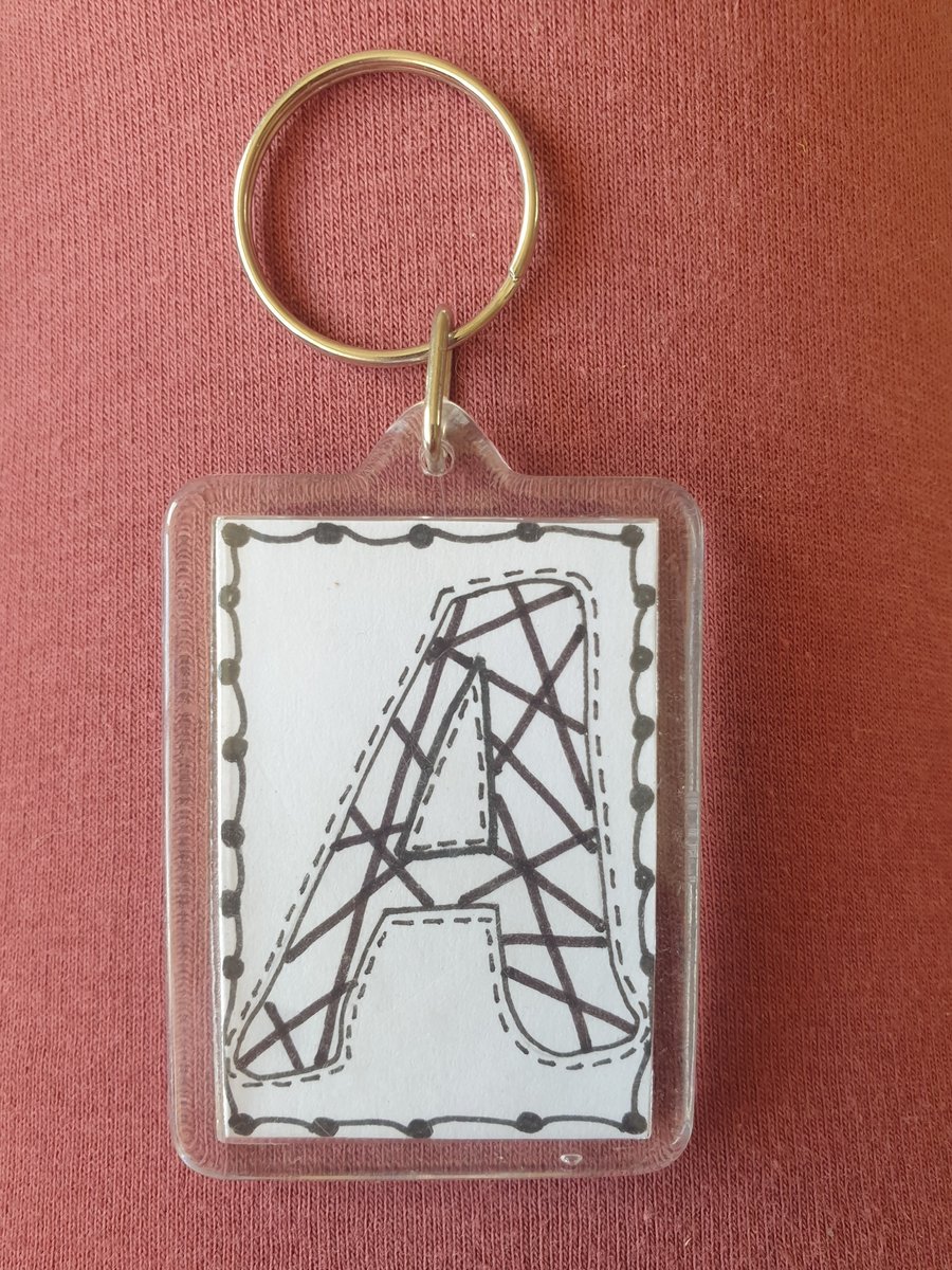 Hand drawn initial "A" keyring.