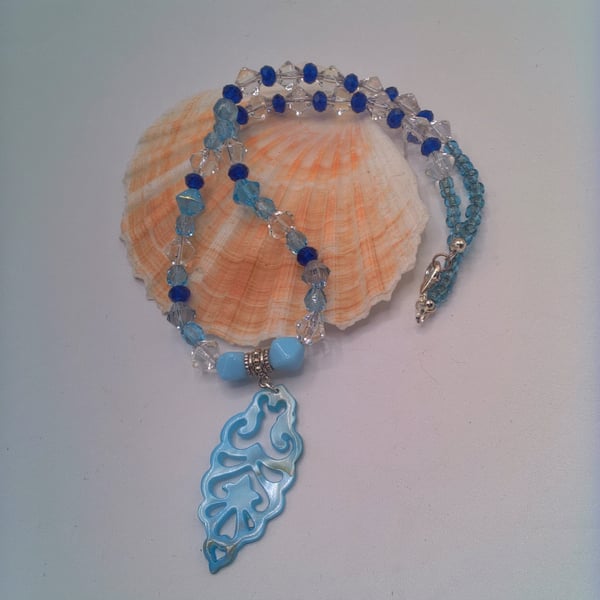 Necklace with Blue and Clear Bicone Beads and a Shell Pendant, Blue Pendant
