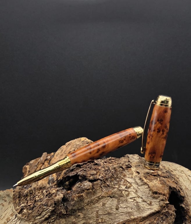 Handcrafted Thuya Burr Wood Rollerball pen with Gold and Black Titanium finish