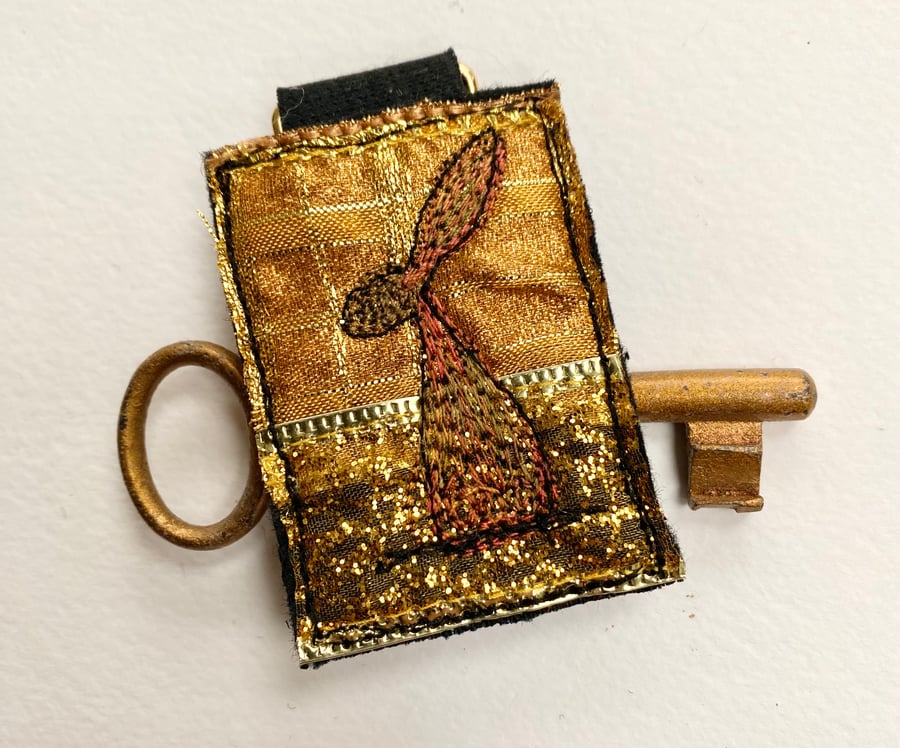Up-cycled hare key ring or bag charm. 