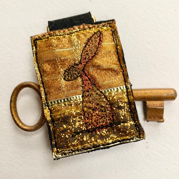 Up-cycled hare key ring or bag charm. 