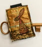 Up-cycled hare key ring or bag charm. 