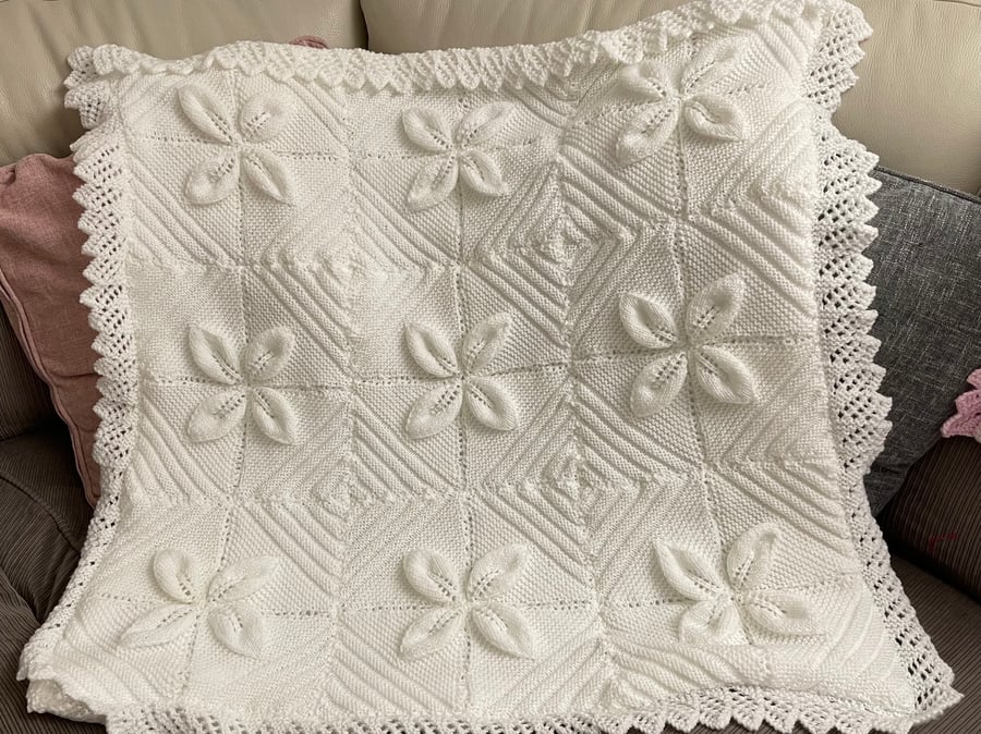 Beautiful hand knitted baby blanket with leaf design 