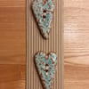 Long patterned ceramic heart buttons