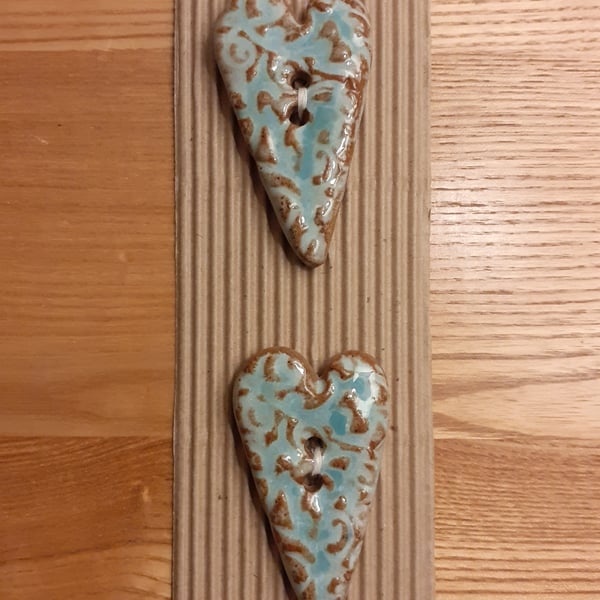 Long patterned ceramic heart buttons