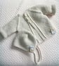 Hand knitted baby cardigan, baby coat and bonnet