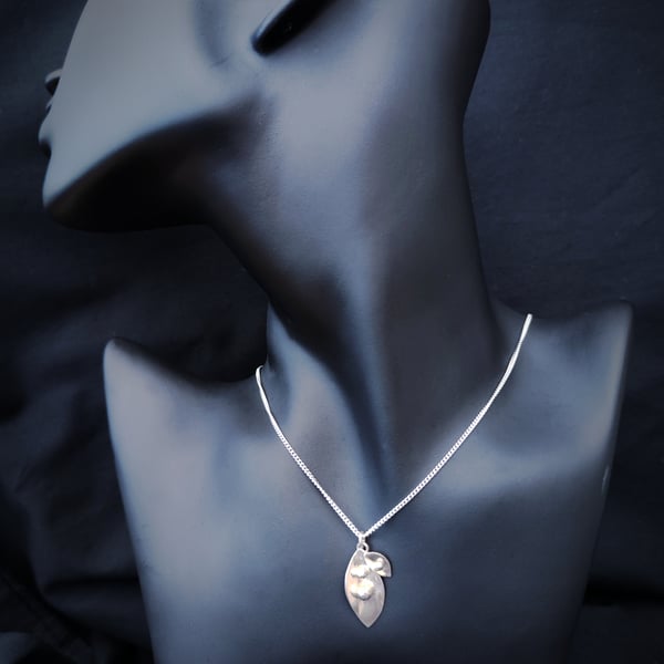 Sterling silver pendant with leaves