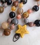 Jasper knotted cord necklace in earthy colours with yellow howlite star - Image 3