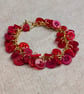 Red button bracelet with gold chain and toggle clasp  - Image 6