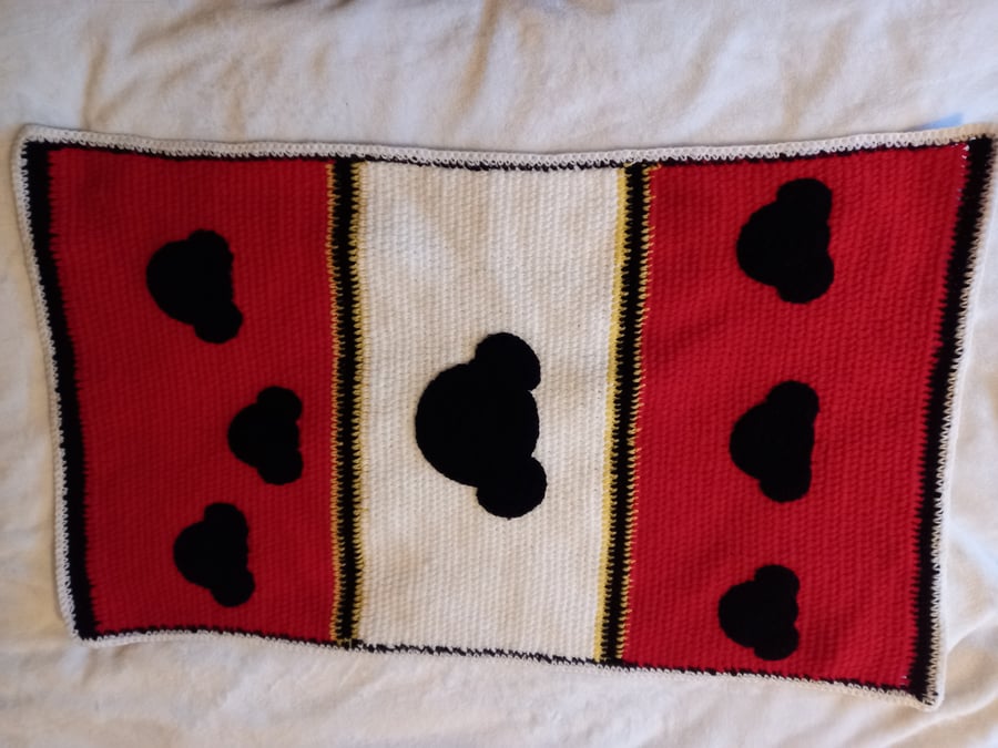 Hand crocheted red,white and black baby pram blankey