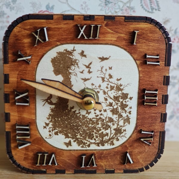 Pretty wooden clock with girl and butterflies