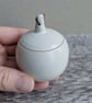 Very small handmade ceramic snowball lidded pot, mini snowman with twig arms - Image 8