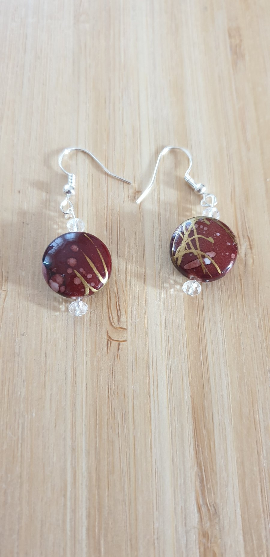 Brown round earrings