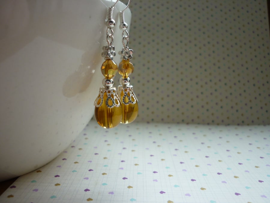 TOPAZ AND SILVER DANGLE EARRINGS.