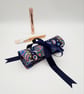 Navy blue make up wrap with colourful pattern.  - Image 7