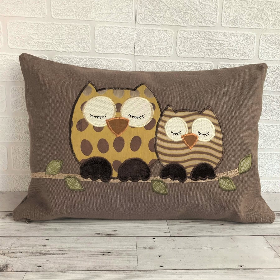 Sleepy owls cushion in brown and mustard