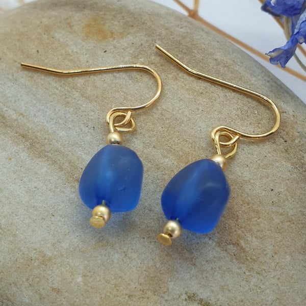 Gold plated earrings with faux sea glass beads royal blue boho dangle drop