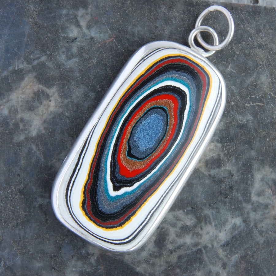 Harley fordite and sterling silver pendant