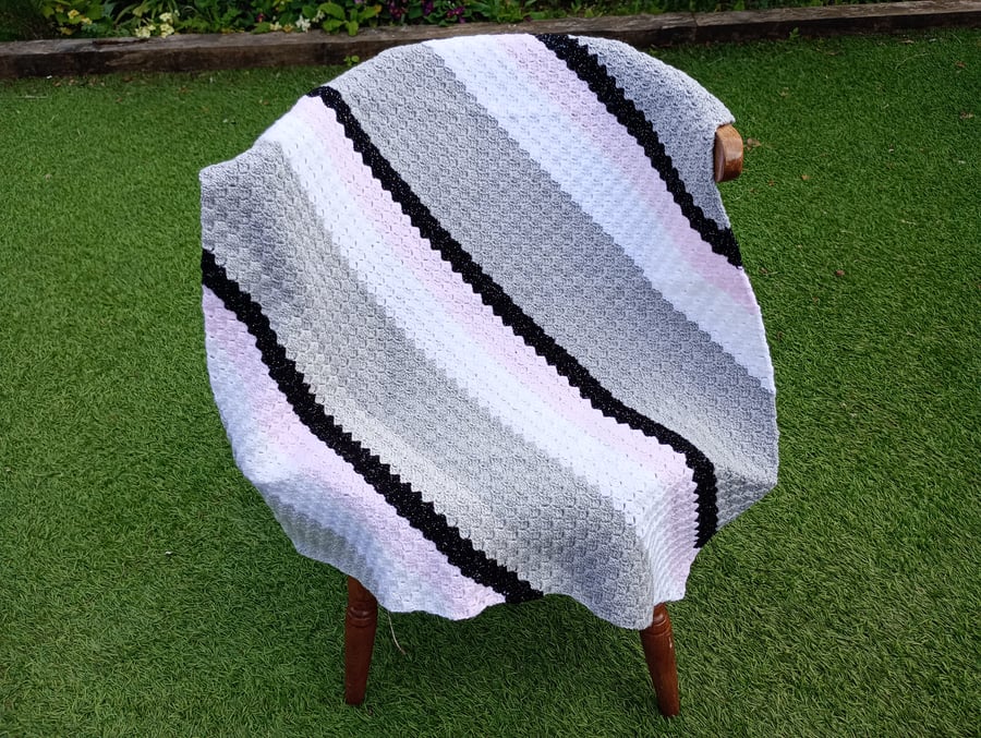 Crochet baby blanket in pink, white, grey & black glitter yarn