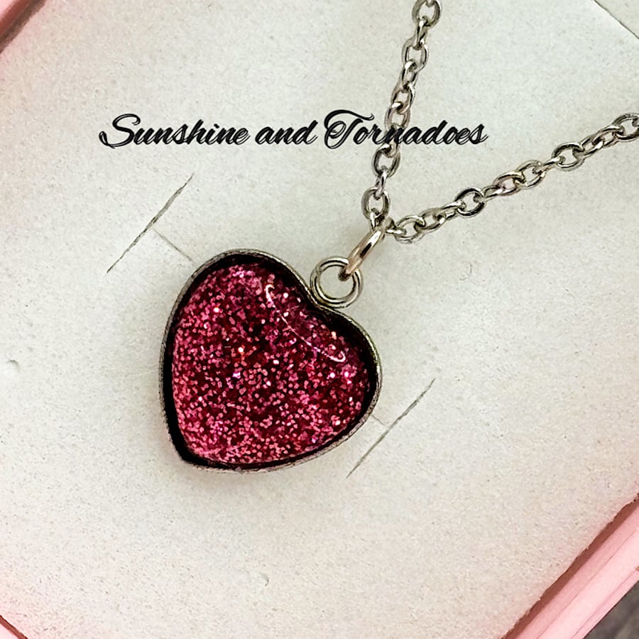 Handcrafted Pink Glitter Resin Heart Pendant. Stainless Steel.