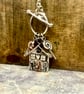 Handmade Silver Gingerbread House Pendant - Image 1