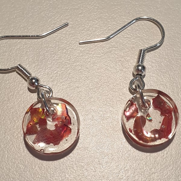 Round red mother of pearl resin earrings