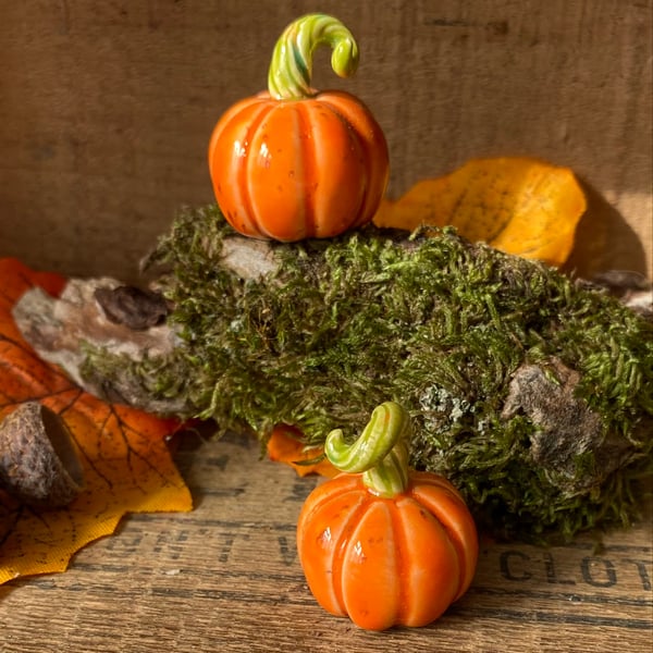 Set of two really small ceramic pumpkins 