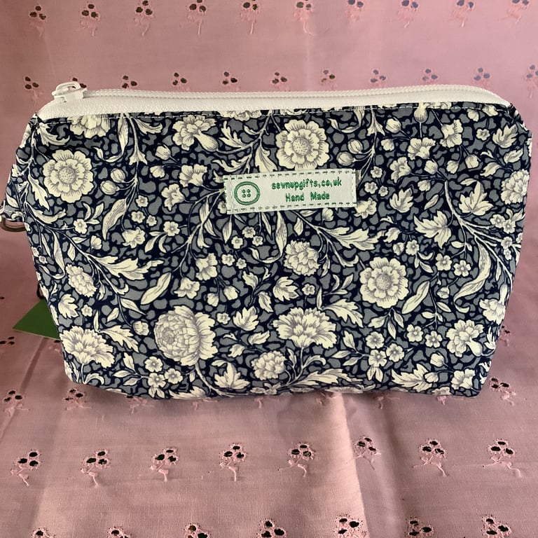 Pretty and traditional blue and white make up or cosmetic pouch